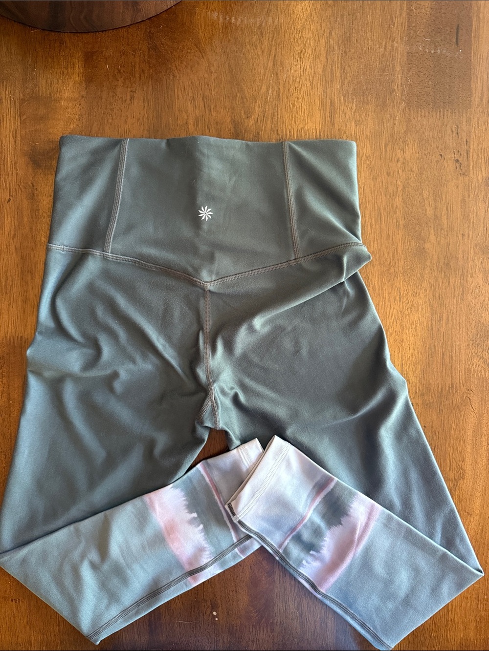 Athleta Sage Green Elation 7/8 leggings.  small w/ light pink ombré bottoms.